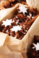 freshly baked gingerbread star cookies in a box.