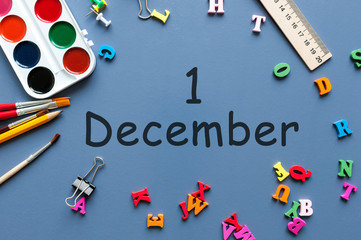 December 1st. Day 1 of december month. Calendar on businessman or schoolchild workplace background. Winter time