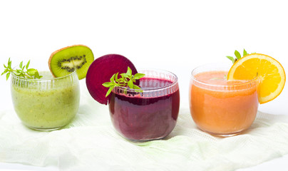 Colorful smoothies with fruits isolated