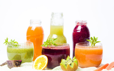 Colorful smoothies with fruits isolated