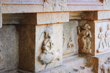 Details of bas relics and panels depicting the story of the epic Ramayana at Hazara Rama Temple in Hampi, Karnataka, India.