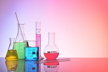 Laboratory glass chemical containers colorfull concept