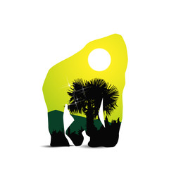 Silhouette of gorilla with tropical landscape.