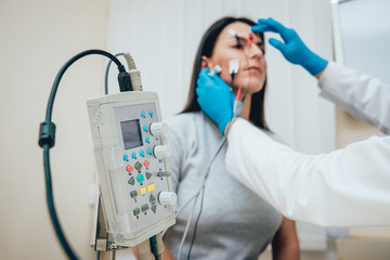 Patient nerves testing using electromyography. EMG