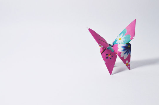 colorful origami butterfly on white background