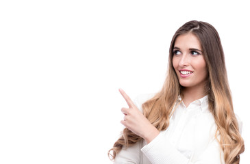 Happy beautiful businesswoman pointing on something isolated on white background