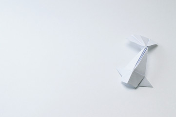 origami koi fish on white background