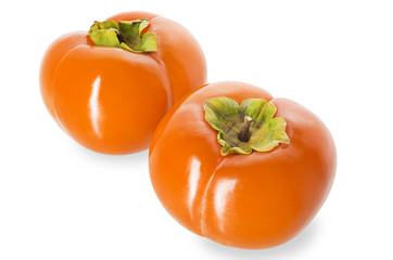 Persimmon fruit closeup isolated on white background. Clipping path.