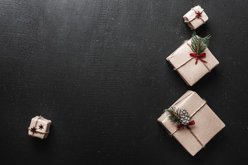 Christmas card. Symmetrically arranged gifts on the right side of the picture in the shape of decorative fir, holding space for Christmas message. great Christmas arrangement