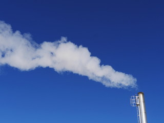 chimney smoke blue sky