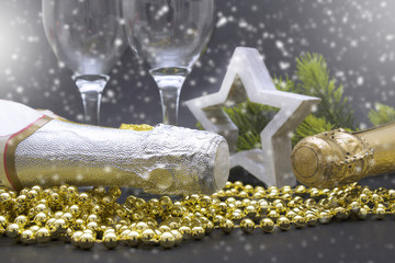 romantic Christmas background with champagne and Christmas decorations