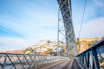 Fototapeta premium View on the famous Luis iron bridge during the morning light in Porto, Portugal