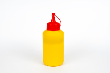 yellow jar with red cap on white background for oil or glue, oiler, carpenter's glue, for text