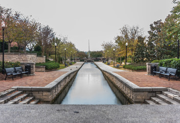 Waterway in park with benches