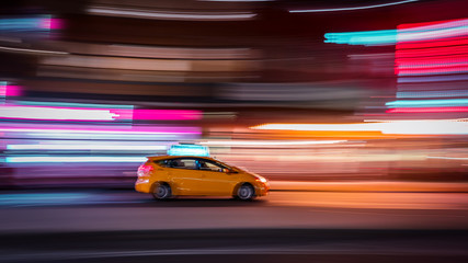 Obraz premium Taxi cab concept motion blur