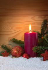 Christmas red decoration and Advent candle. Christmas card.