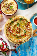 Avocado hummus, delicious and healthy vegetarian dip, top view