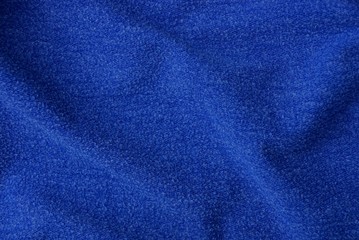 Fototapeta na wymiar текстура ткани из мятой материи синего цвета