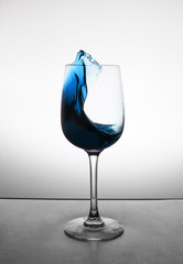 glass of blue alcohol