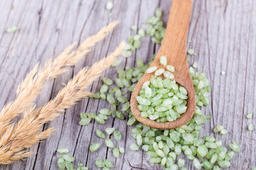 Bamboo or jade pearl rice in a spoon