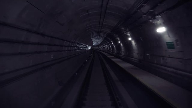 Fast underground train riding in a tunnel in Kuala Lumpur, Malaysia