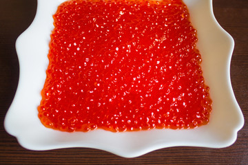Square plate with caviar.