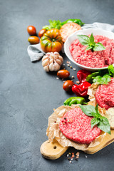 Homemade raw organic minced beef meat burger cutlet and vegetables
