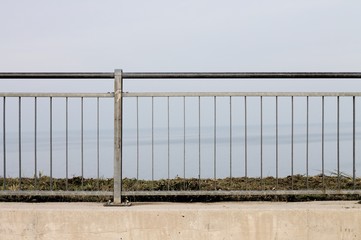 Fence - Steel railing over the sea (Fano, Italy)