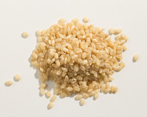 Whole Short Grain Rice Seed. Pile of grains. Top view.