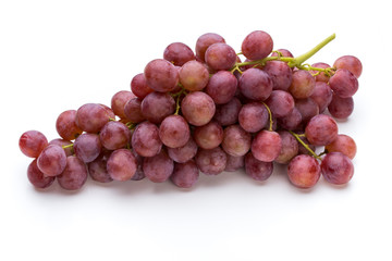 Ripe red grape isolated on white.