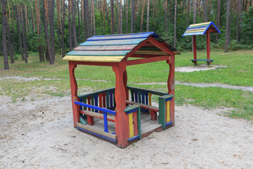 Children's playground in the summer park. Urban