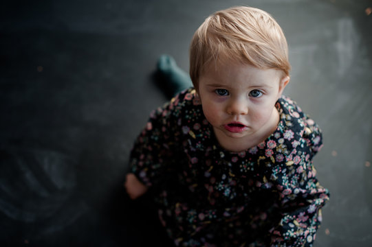 baby girl looking up