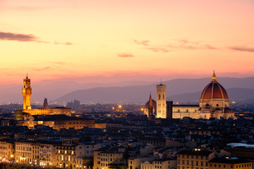 The city of Florence at sunset with the famous Duomo and the Palazzo Vecchio