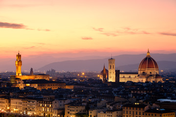 Fototapeta premium The city of Florence at sunset with the famous Duomo and the Palazzo Vecchio