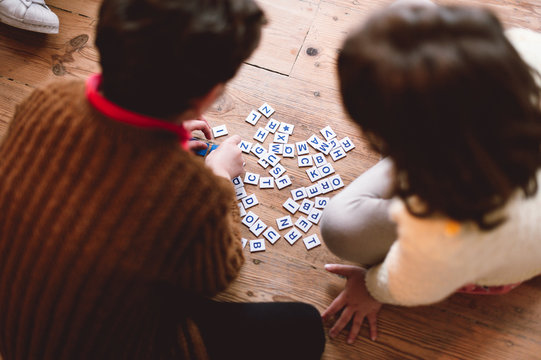 siblings playing crosswords