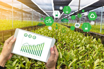 agriculture technology concept man Agronomist Using a Tablet Internet of things  report
