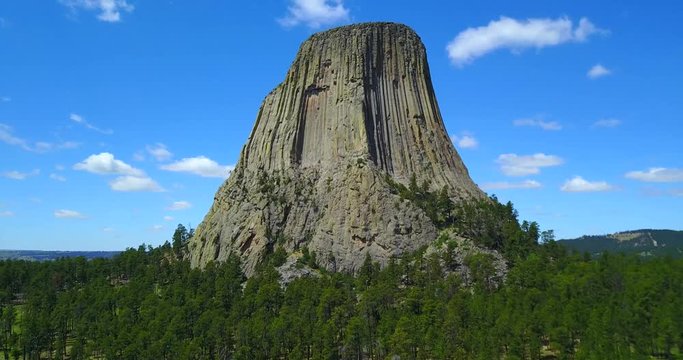 Devil's Tower With Blue Sky - Aerial Panning View - Wyoming, USA