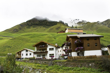 Fototapeta na wymiar Villages of Tschlin and Ramosch at beside road between go to Samnaun