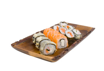 assorti set sushi on wooden board isolated on white background