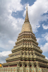 Fototapeta premium Pagoda is in Wat Pho that was named as the temple of the pagoda or chedi that are decorated with yellow glaze or glazed tiles or dark blue. 