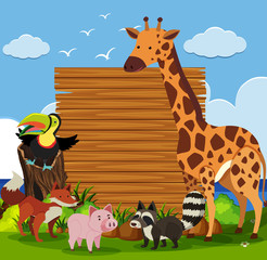 Wooden board template with wild animals in garden