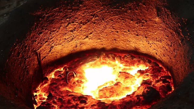 Molten metal in Induction Furnace for casting Iron manufacturing