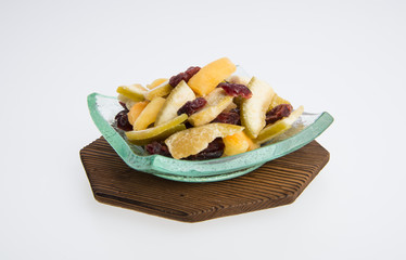Dried fruits or assorted preserved fruits on background.
