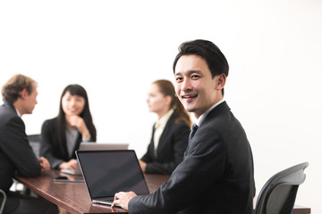 Businessman in meeting room.