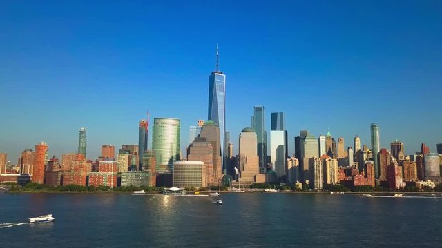 Pullback reveal video: Aerial cityscape view of New York City, One World Trade Center and Lower Manhattan
