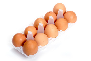 Eggs in a container isolated on a white background