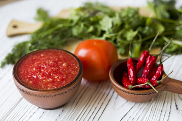 vegetarian dishes and vegetables - tomato, chilli and fresh herbs - dill parsley Basil