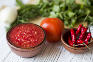 vegetarian dishes and vegetables - tomato, chilli and fresh herbs - dill parsley Basil