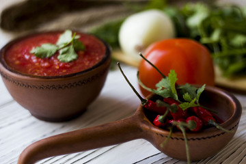 vegetarian dishes and vegetables - onion, tomato, chilli and fresh herbs - dill parsley Basil