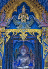 Buddha statue at the Blue Temple Chiang Rai Thailand